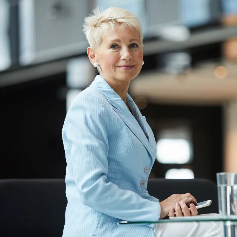 female executive in light blue suit